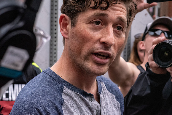 Jacob Frey talking with man about police brutality.