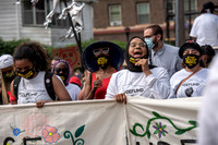 Woman chanting.