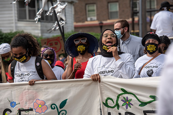 Woman chanting.