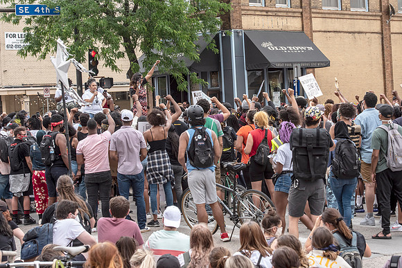 Organizers called people of color to move to front.