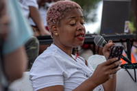 Junauda Petrus reading from her poem, Can We Please Give the Police Department to the Grandmothers?