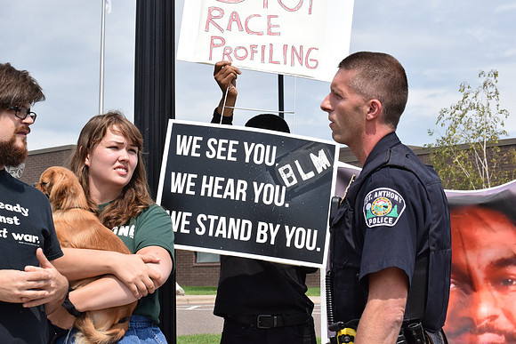 captspiesstalkswithprotesters_31619367621_o
